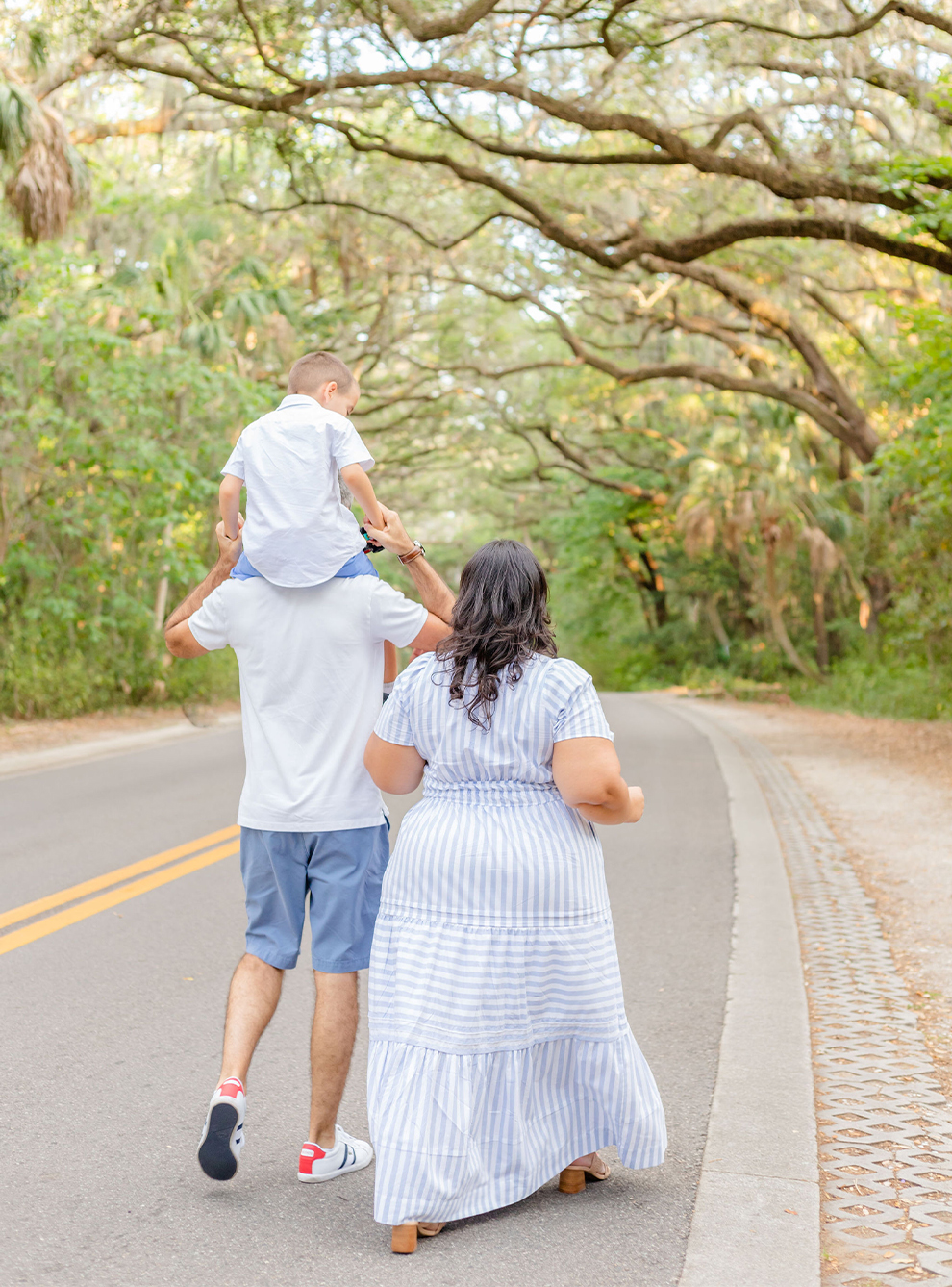 Family walking away at a park