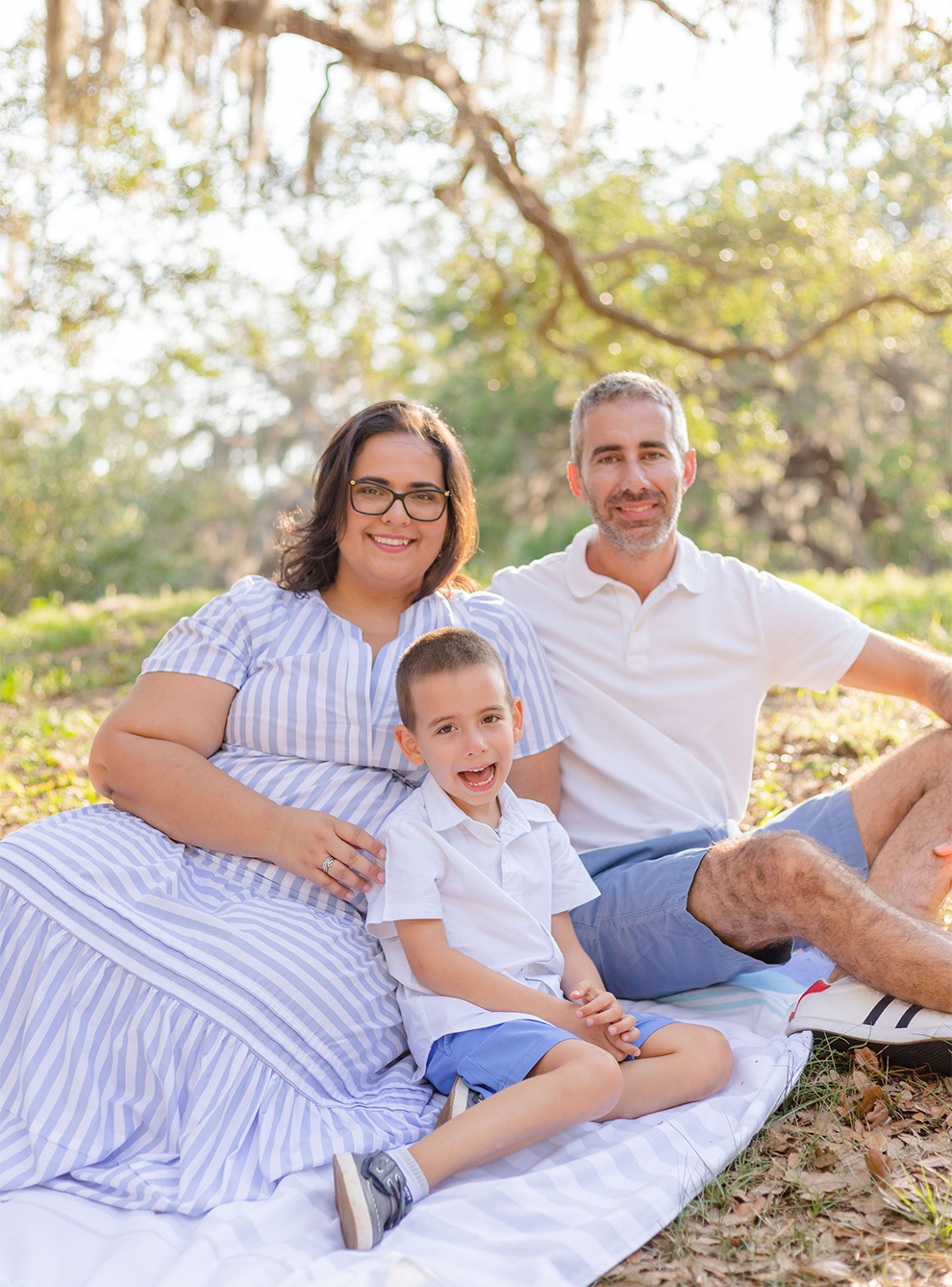 Family sitting at park