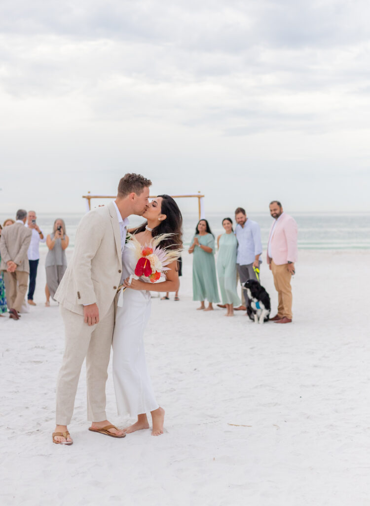 After the ceremony, kiss the wedding couple at St Pete Beach, Florida