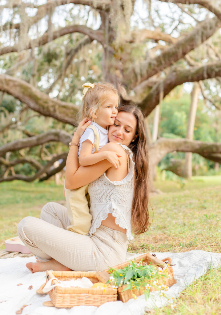 Mama hugging her little girl at Philippe's park