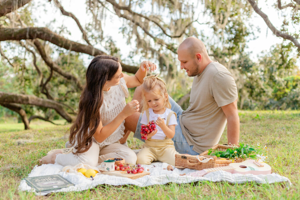 Family enjoying a picnic at Philippe Park,